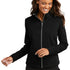 Woman wearing a black zip-up jacket on a white background