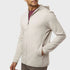 Front side angled view of men’s cream oat beige performance zip up hooded jacket on model – Louvóre apparel