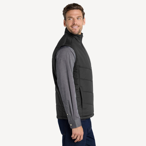 Side view of men’s black water resistant puffer vest with chest pockets on model – Louvóre athleisure apparel