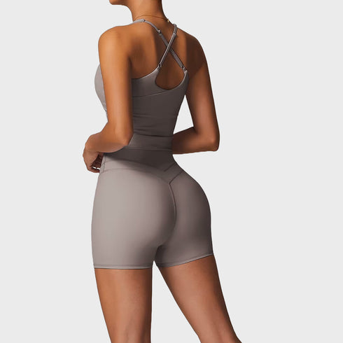 Back view of women’s beige khaki tan athletic tank top and biker shorts set – Louvóre athleisure apparel