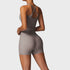 Back view of women’s beige khaki tan athletic tank top and biker shorts set – Louvóre athleisure apparel