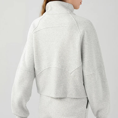 Back view of women’s cropped oversized half zip hoodie on model – Louvóre athleisure apparel