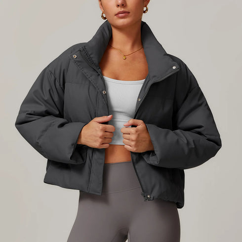 Front view of women’s gray down filled puffer jacket on model – Louvóre athleisure apparel