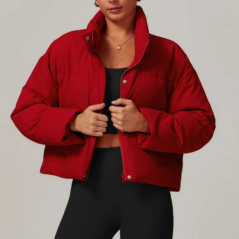 Front view of women’s red down filled puffer jacket on model – Louvóre athleisure apparel