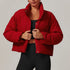 Front view of women’s red down filled puffer jacket on model – Louvóre athleisure apparel