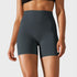 Front view of women’s dark seal blue high waisted yoga biker shorts on model – Louvóre athleisure apparel