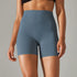 Front view of women’s seal blue high waisted yoga biker shorts on model – Louvóre athleisure apparel