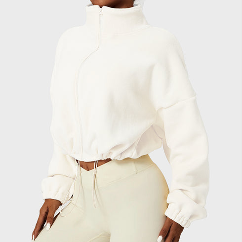 Front view of women’s oversized long sleeve fleece jacket on model – Louvóre athleisure apparel