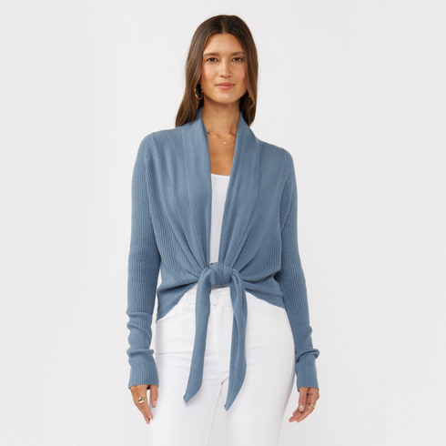 Zoomed in front view of women’s heather blue waffle knit long sleeve tie front cardigan on model – Louvóre athleisure apparel