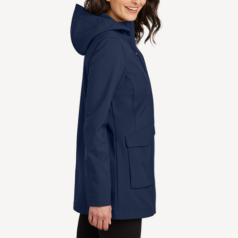 Side view of women’s navy water-repellent long jacket on model – Louvóre apparel